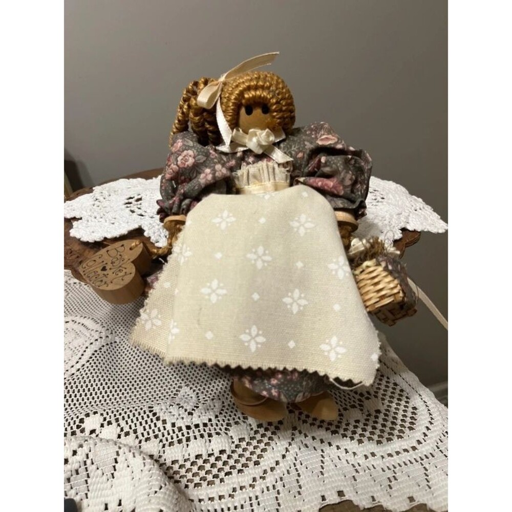 Folk art handmade wooden spool doll